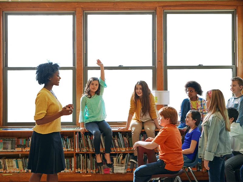 Teacher teaching students in a classroom